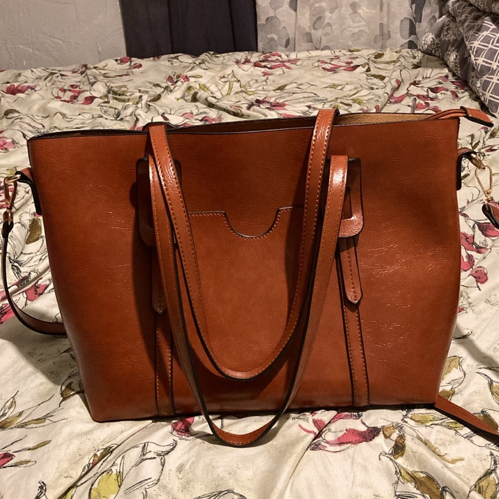 Tan brown purse about  16x10.